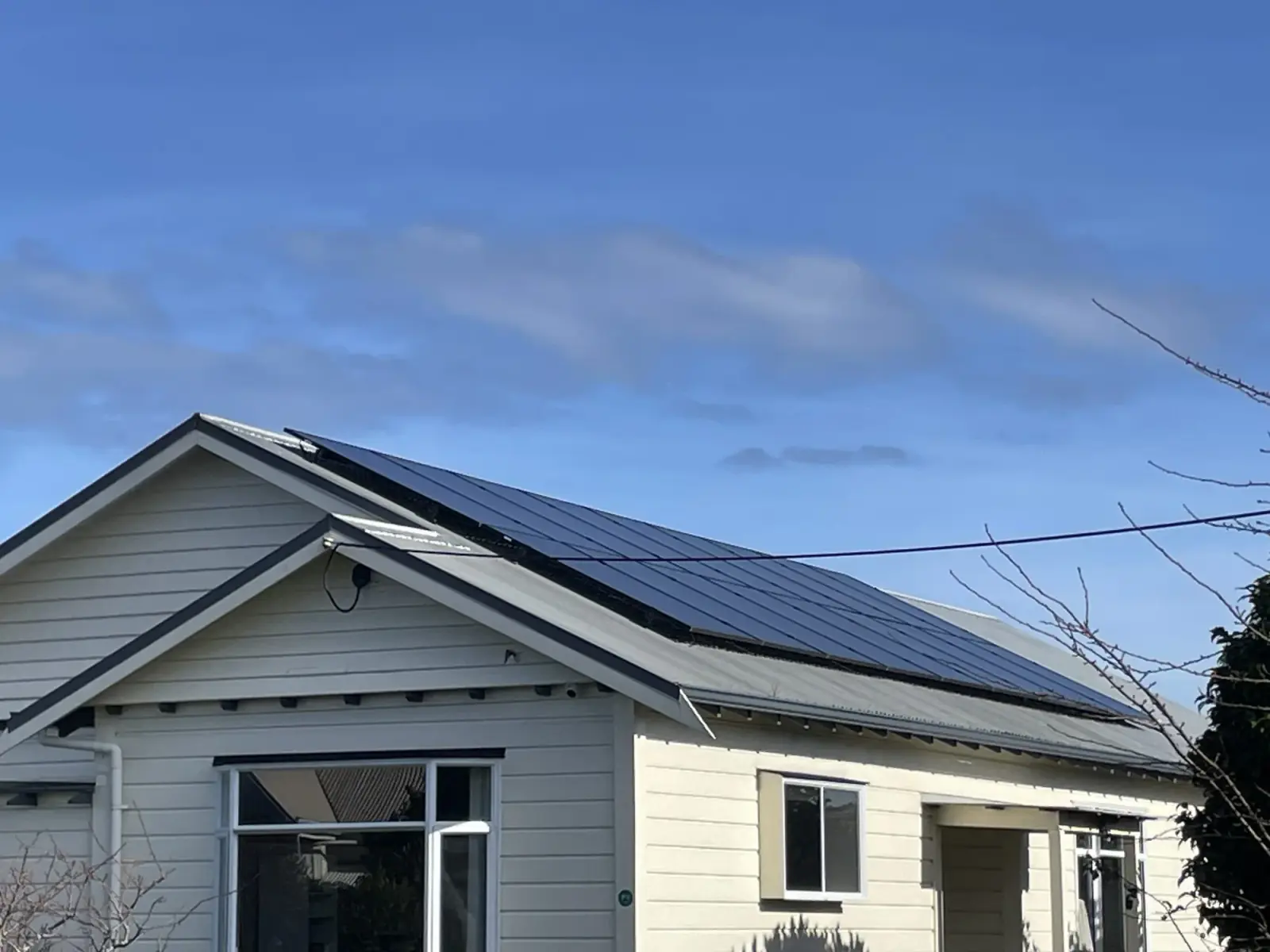 Solar PV array on the roof of a Dunedin villa, installed by Serviceman